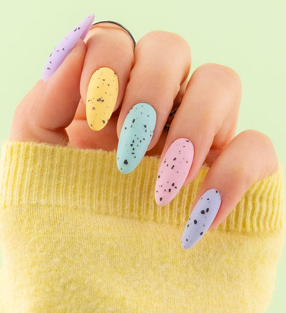 Youthful colorful nails styling with black specks