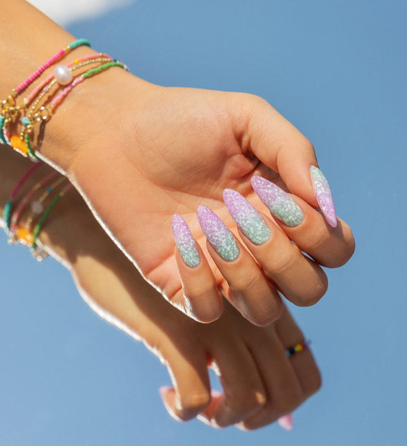 Vacation colorful manicure with white specks