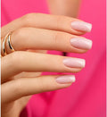 Delicate pink nails with subtle, speckled shine