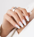 Delicate manicure in milky white color