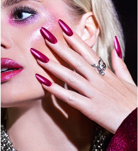 Bold pink nails with pulsating specks