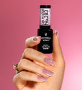 Delicate pink nails with holographic specks and Flash effect
